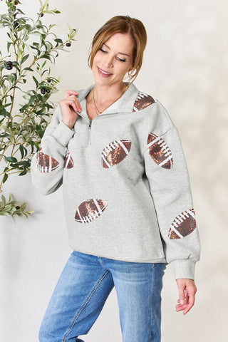 Double Take Full Size Sequin Football Half Zip Long Sleeve Sweatshirt Trendsi